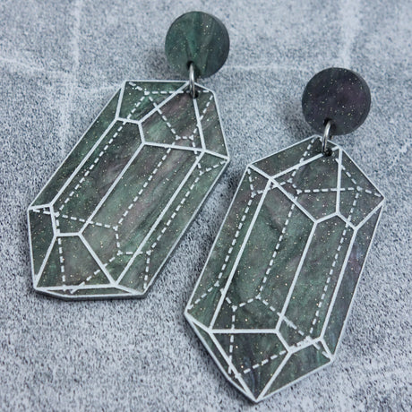Close up image of variation 1 in crystal design laser cut acrylic earrings.