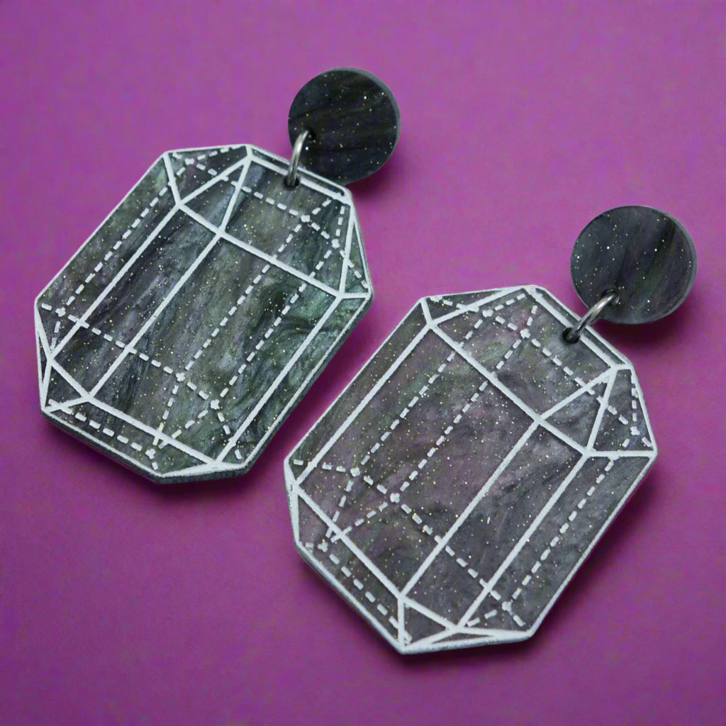 Close up image of variation 5 in crystal design laser cut acrylic earrings.