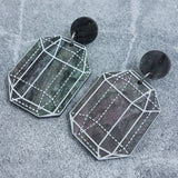 Close up image of variation 5 in crystal design laser cut acrylic earrings.
