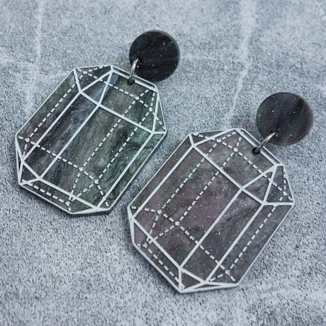 Close up image of variation 5 in crystal design laser cut acrylic earrings.