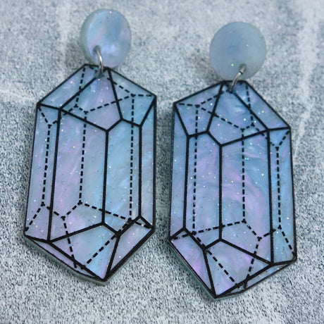Close up image of variation 1 in crystal design laser cut acrylic earrings. 