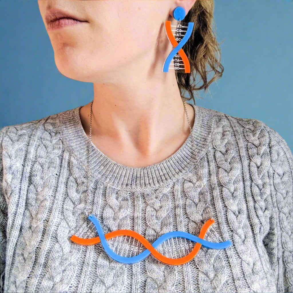 Blue and Orange DNA Acrylic Earrings and DNA Acrylic Necklace being modelled.