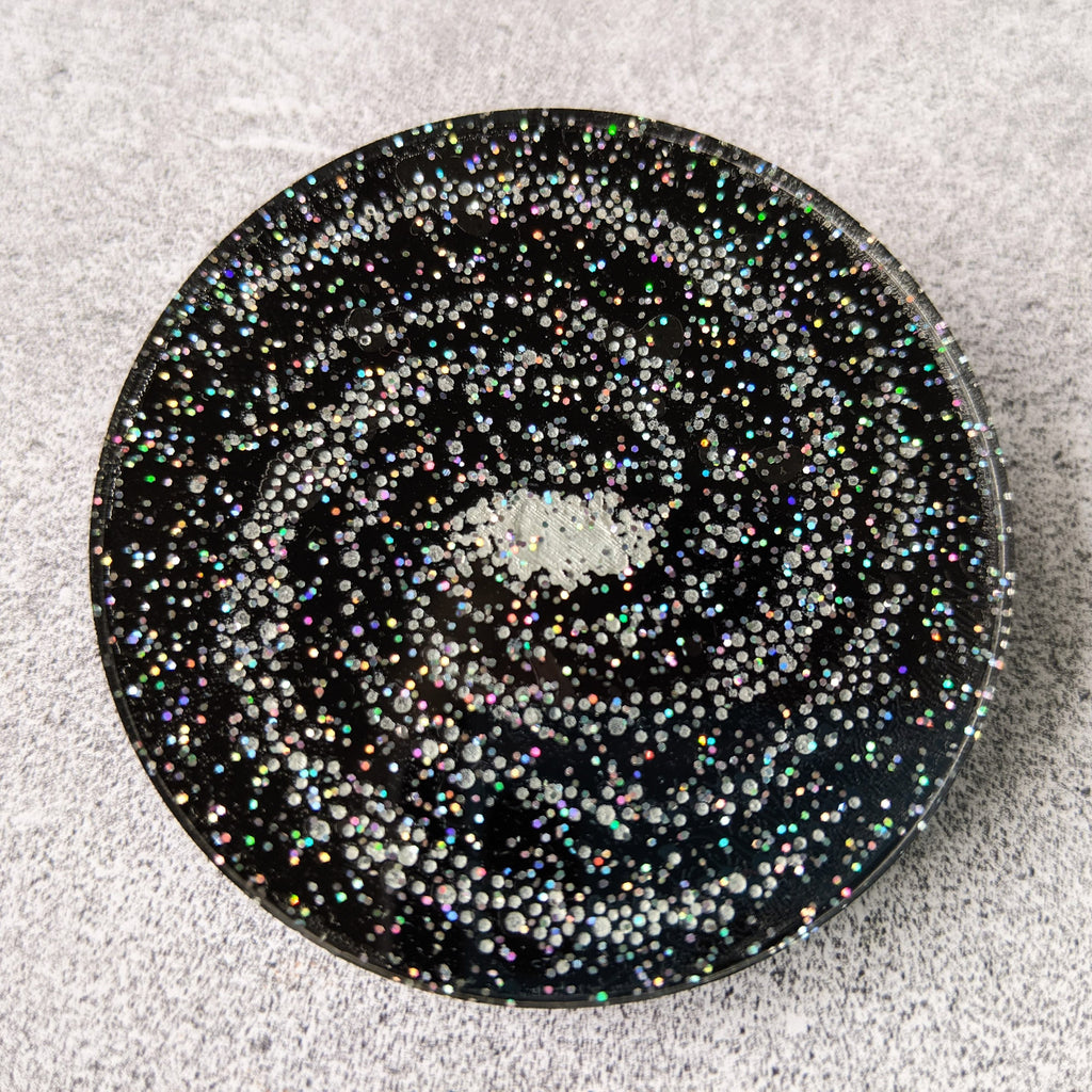 Laser Cut Acrylic Milky Way Galaxy Brooch 60 cm diameter disc. Black with Glittery Stars. Closeup