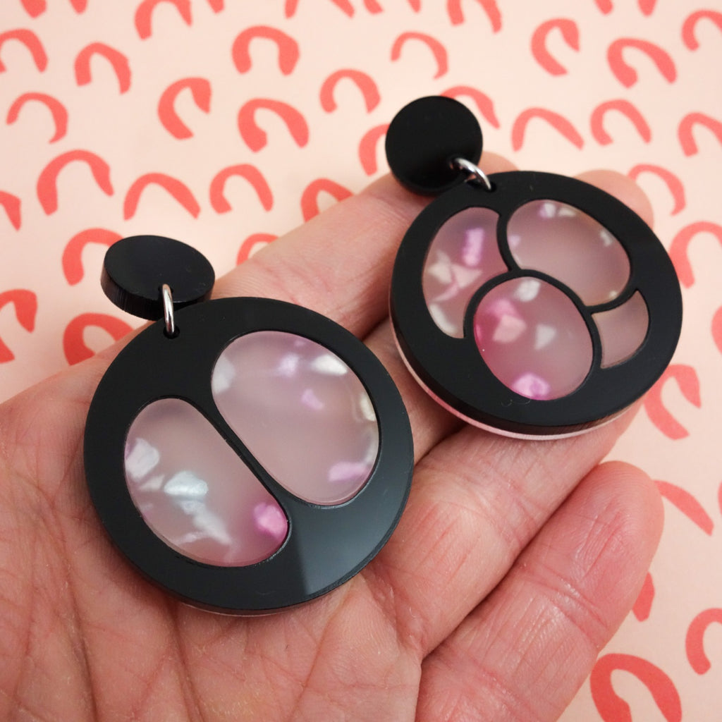 Laser Cut Acrylic Meiosis Earrings. Black and Pink Round Asymmetrical Earrings Depicting Cell Division.