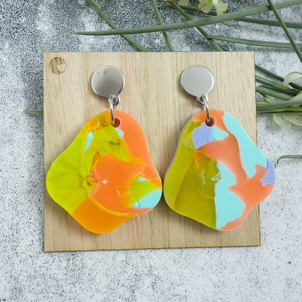 Organic shaped one-of-a-kind recycled acrylic earrings with stainless steel toppers. 