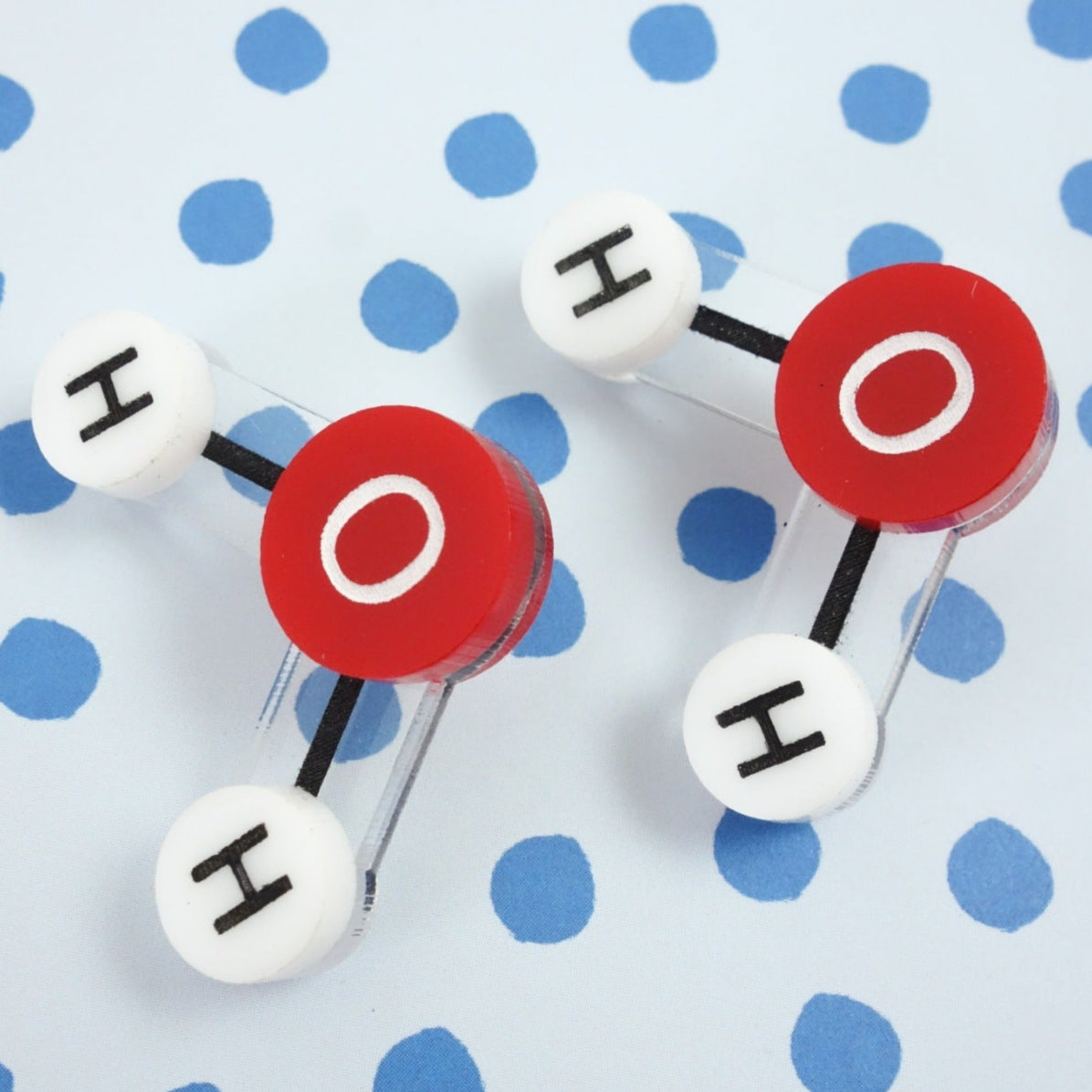 Laser Cut Acrylic Water Molecule Earrings. Ball and Stick Molecule with Oxygen and Hydrogen Atoms. Red and White Colourway. 