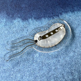 The back of the bacteria brooch design, showing the stainless steel brooch pin and rolling clasp.